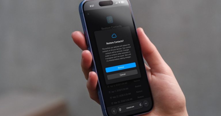 iPhone-in-hand-showing-restore-contacts-page