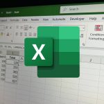 picture-of-an-excel-sheet-with-the-excel-logo-in-the-middle